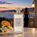Perfume Lescent Nº 6 Gracieuse Cannes 100ml em mesa de mármore num terraço da Riviera Francesa, com meia laranja e flores de jasmim